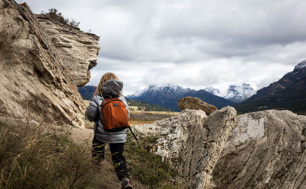 A child hiking with The Sprout.